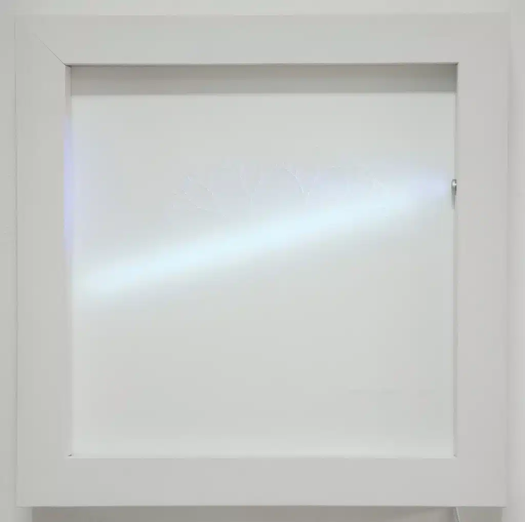 “Fractals. Angolo di ramificazione 25° Sx” 2025 – tecnica mista su carta cotone forata, led, legno e vetro / mixed media on perforated cotton paper, led, wood and glass – cm. 40 x 40 x 7