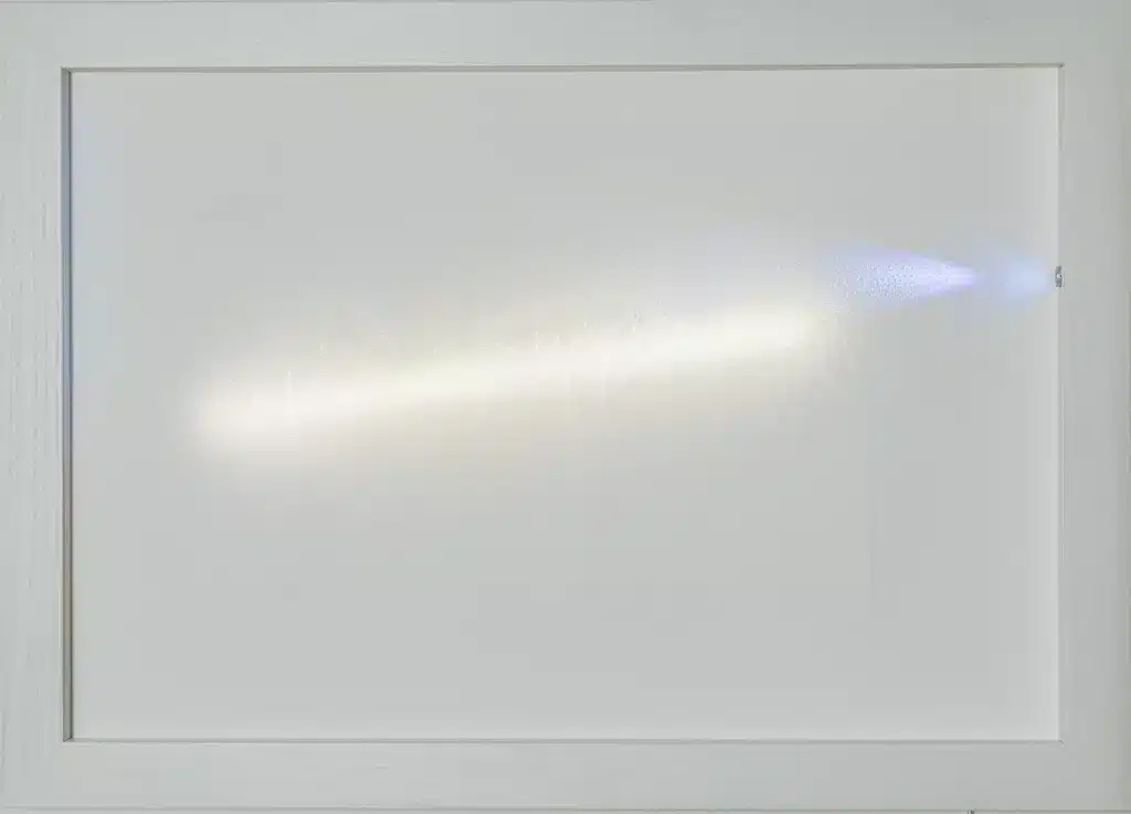 “Fractals. Angolo di ramificazione 15°” 2025, tecnica mista su carta cotone forata, led, legno e vetro / mixed media on perforated cotton paper, Led, wood, and glass – cm. 50 x 70 x 7