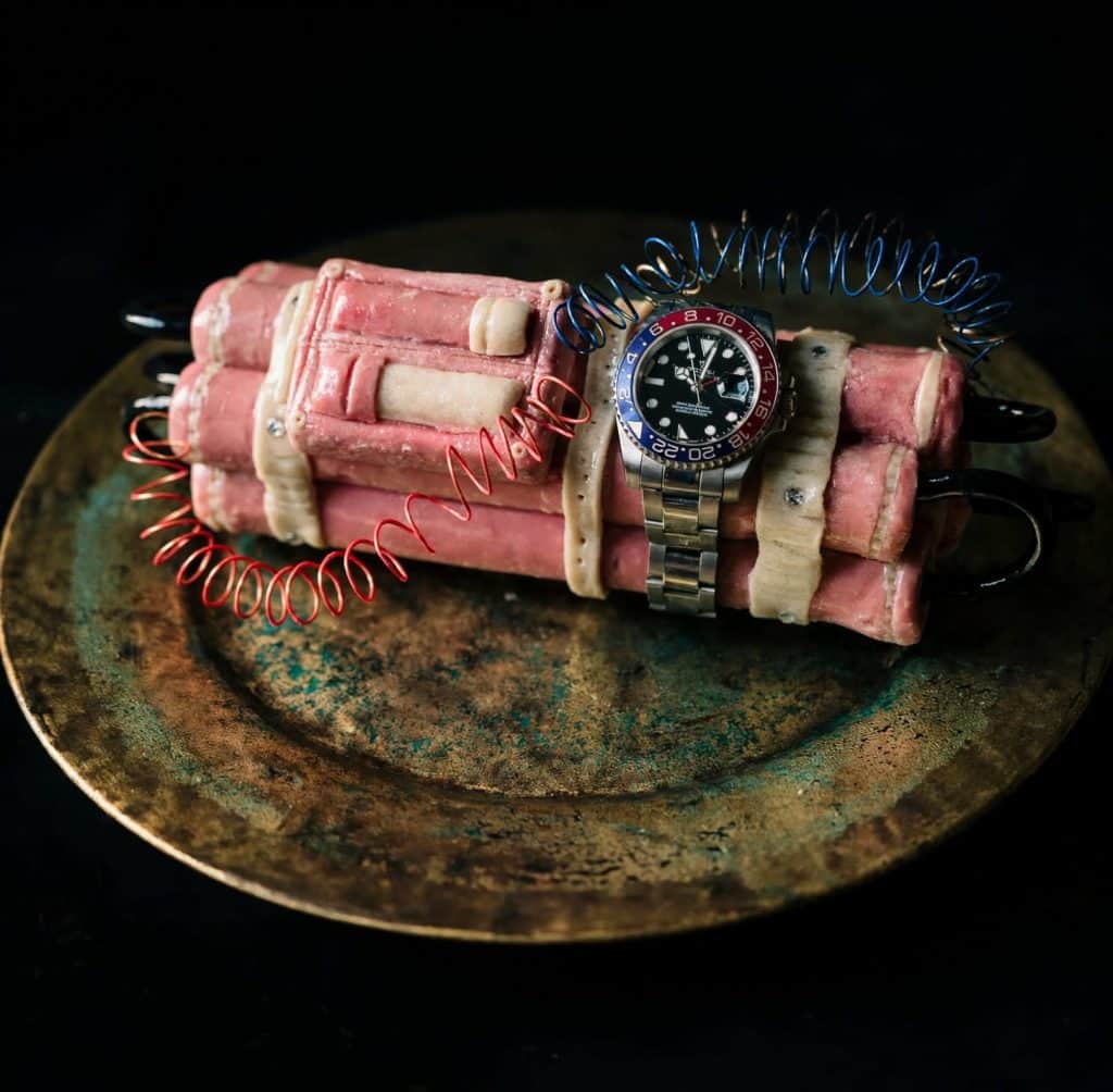 “Bomba” 2026, fiberglass, metallo, orologio, legno, chewing-gum - cm. 10 x 30 x 30